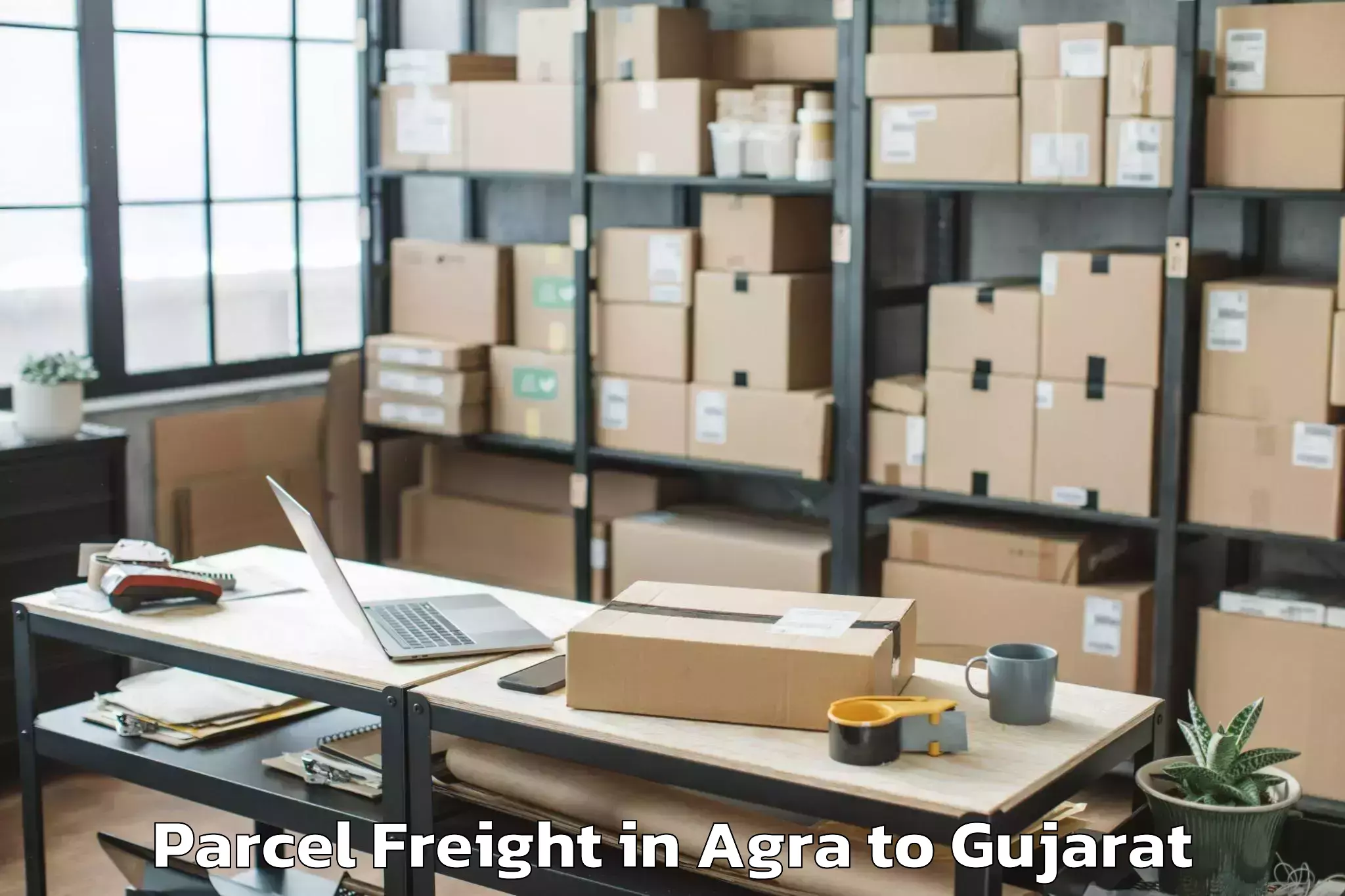 Easy Agra to Bansda Parcel Freight Booking